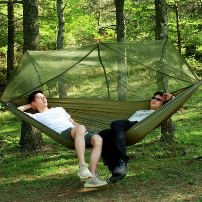 Premium portable camping hammock with integrated mosquito net in green, blue, and grey colours