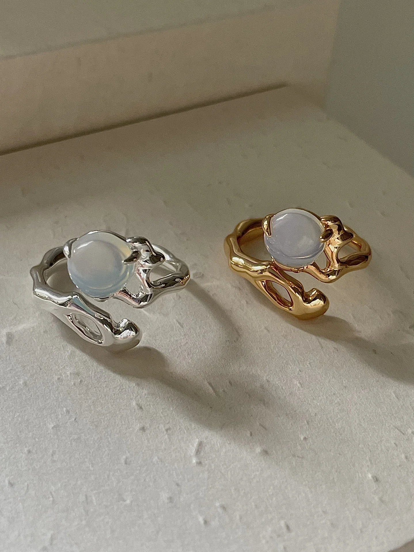 Adjustable sterling silver ring with natural zirconia stones, a versatile and elegant accessory.