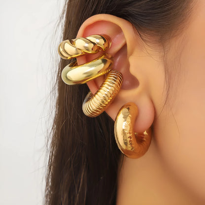 A set of four geometric-shaped clip-on earrings for women in gold or silver ccb.