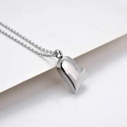 Silver curved 23mm peach heart pendant stainless steel necklace with 51cm + 5cm adjustable chain