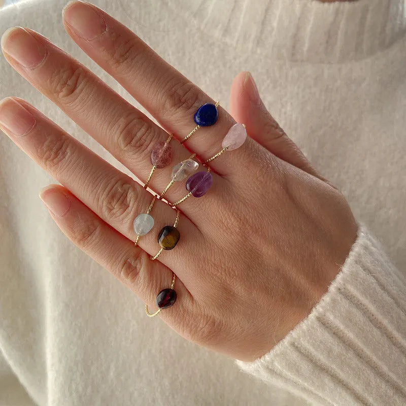 Geometric women's ring with natural agate stone in original design, showing clean lines and contemporary shape