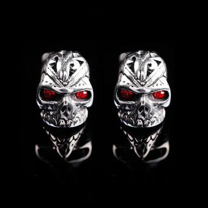 Retro red eye ghost head skull stud earrings with electroplated alloy construction and artificial gemstone inlay