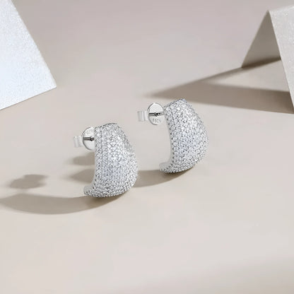 Geometric sterling silver ear studs with moissanite stones in gift box