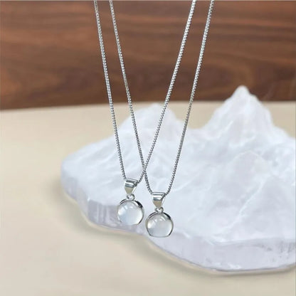 Women's oval pendant necklace with adjustable chain and eight-pointed star crystal in X7 6 Moon Light colour