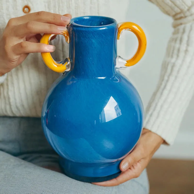 Handmade straight glass vase with a gradient colour effect and polished surface in a Nordic modern style.