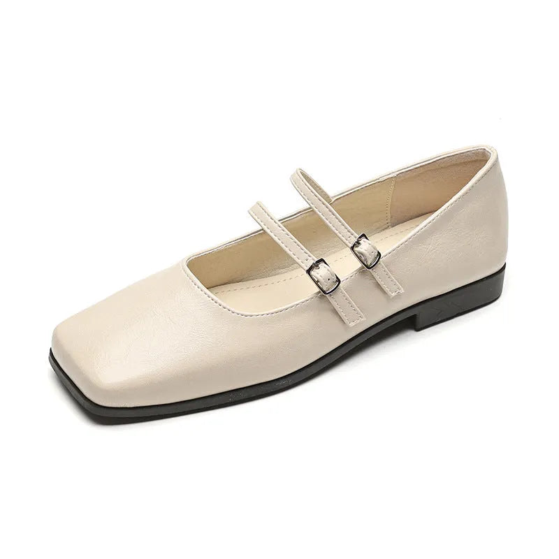 Women's silver genuine sheepskin Mary Jane ballet flats with an adjustable cross-buckle strap on the instep.