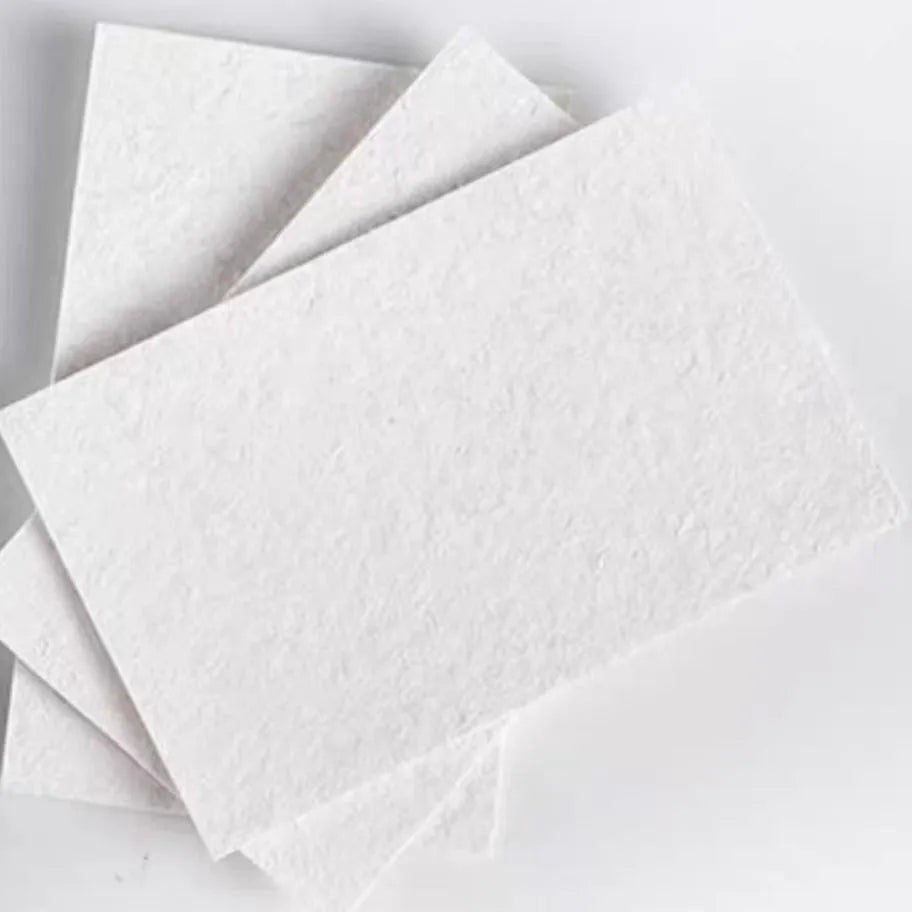 A set of cartoon-patterned wood pulp paper sheets, six fountain pens, and three blank sponge shapes: a heart, a circle, and a square.
