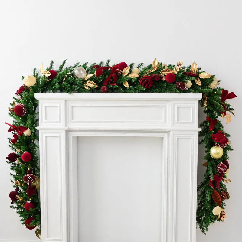 Long 2.7 metre Christmas PE rattan garland with velvet balls and integrated lights in golden leaf or red rattan colour.