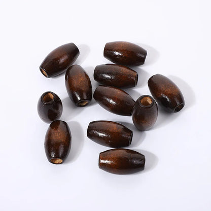 Dark coffee coloured oval wooden bead with M-shaped profile and baked varnish finish