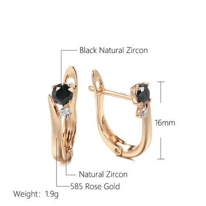 Gold-coloured women's drop earrings with black agate inlay in geometric design