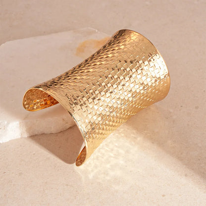 Women's vintage exaggerated oval metal bracelet in gold or silver tone, showing large 6.5 x 9.7 cm dimensions.