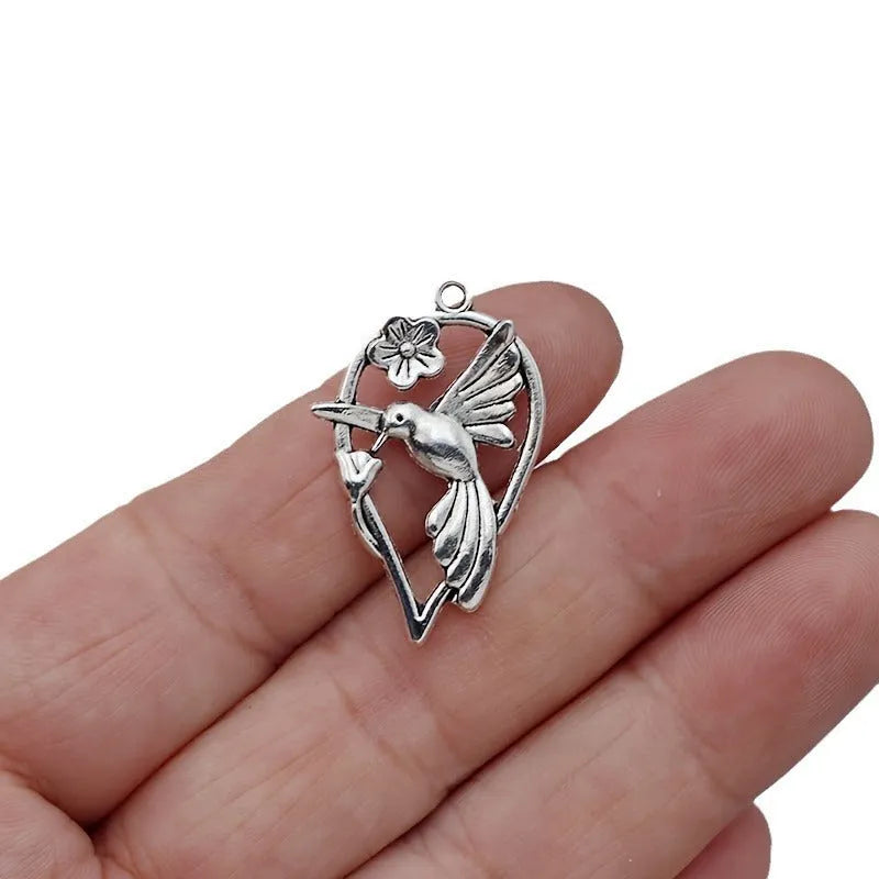 Alloy magpie pendant measuring 3.5cm with electroplated colour P234 finish for DIY jewellery