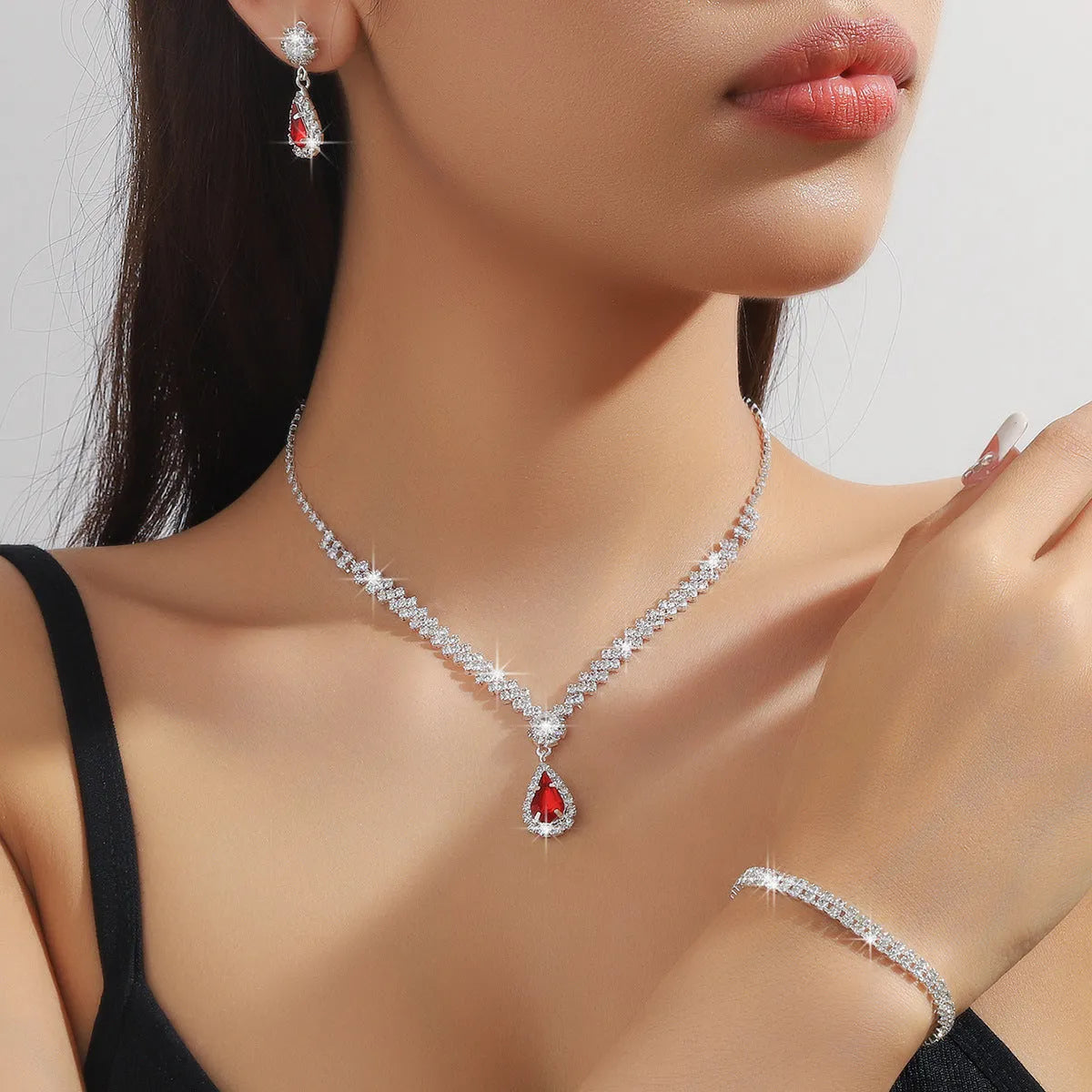 Rhinestone water drop shaped claw chain necklace and earrings jewellery set in selected colour