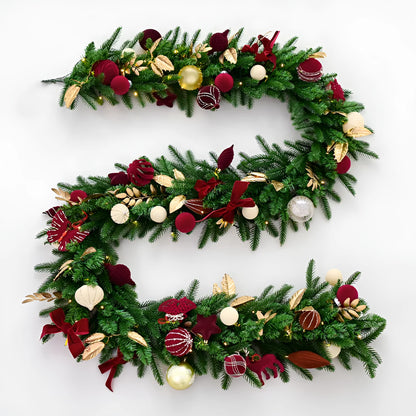 Long 2.7 metre Christmas PE rattan garland with velvet balls and integrated lights in golden leaf or red rattan colour.