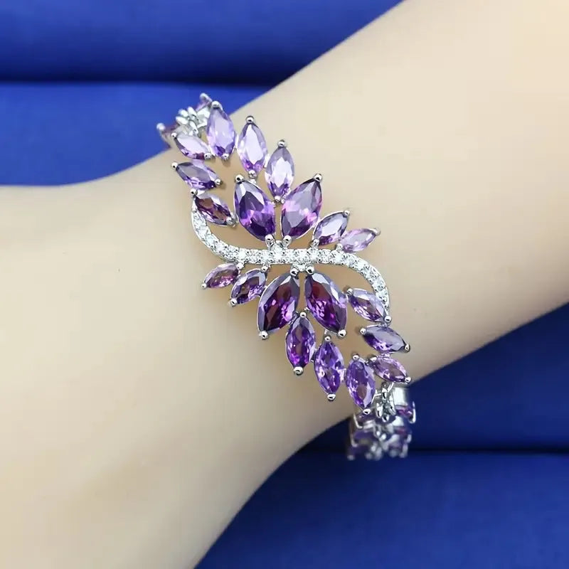 Bracelet in copper with real gold electroplating and micro-inlaid zircon stones, available in multiple colours including blue, green, white, purple and multicolour, featuring ice flower design elements in an affordable luxury style.