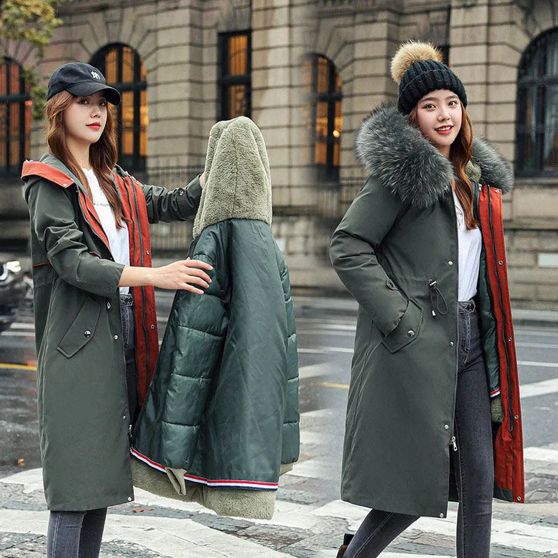 Women's long padded beige trench coat with a fleece lining, shown on a model.