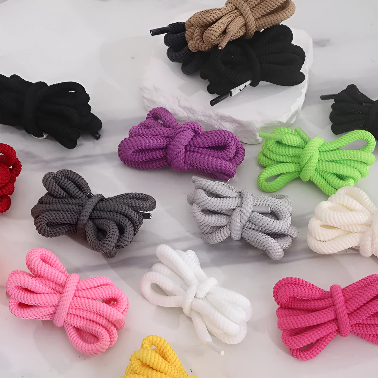 Oval shoelace adapter rope in various colours, showing 1.0cm width and length options for sweatshirts and hats.