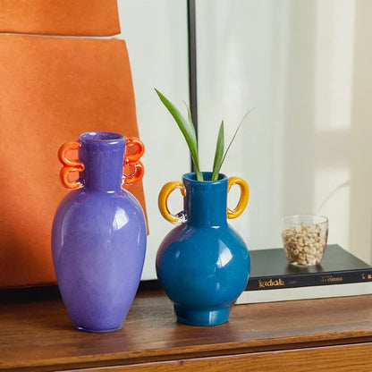 Handmade straight glass vase with a gradient colour effect and polished surface in a Nordic modern style.