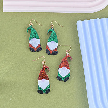 Acrylic Santa Claus cartoon character earrings in red, green, and red/green hat styles.