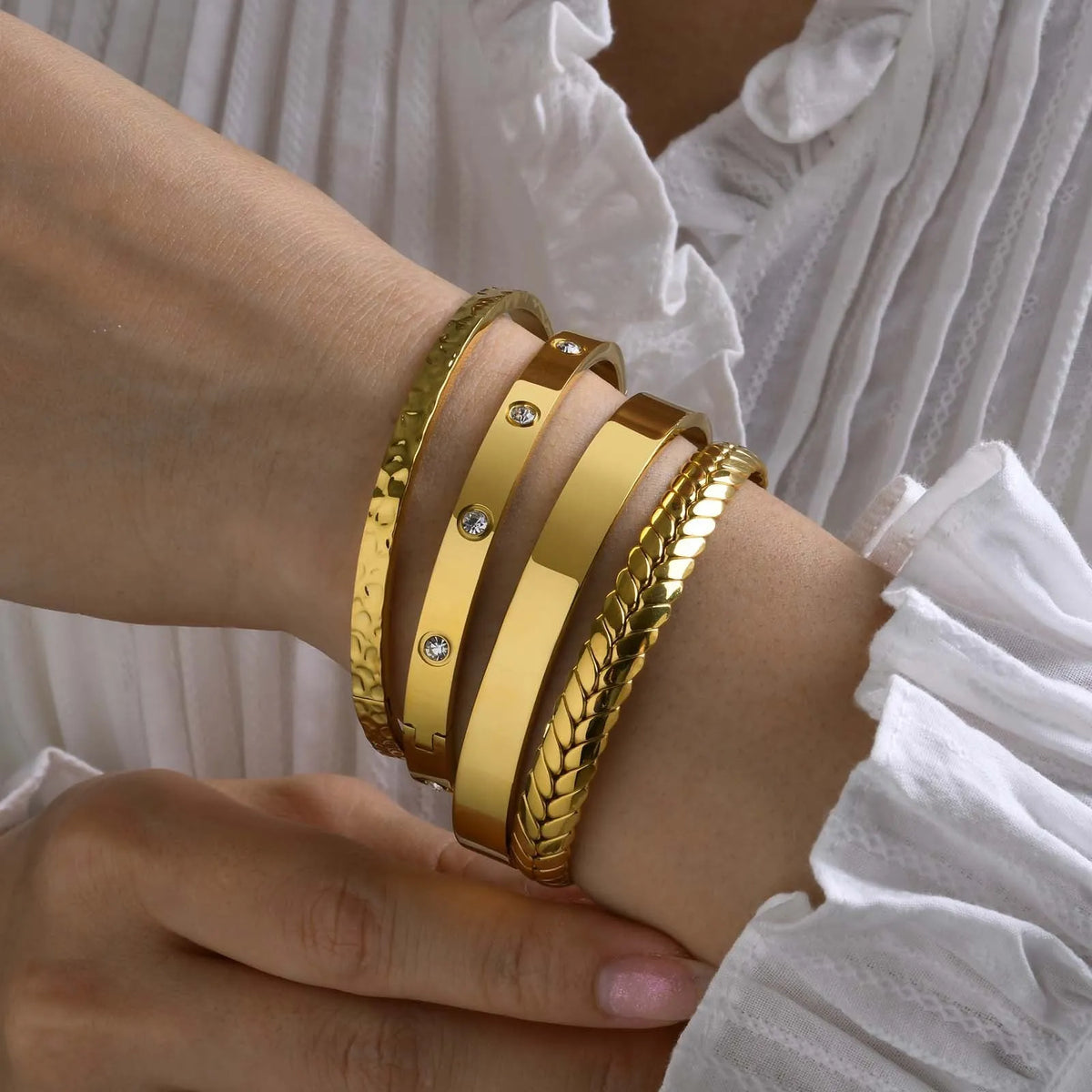 Stainless steel glossy bracelet with drill detail, available in 6mm and 3.9mm widths and multiple colour codes