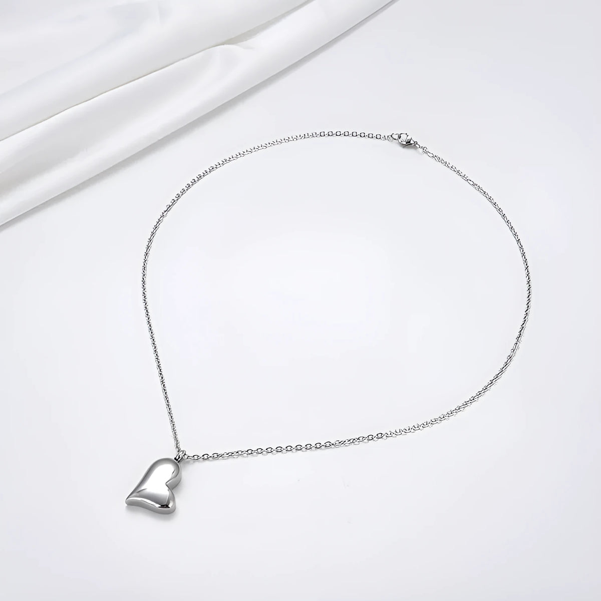 Silver curved 23mm peach heart pendant stainless steel necklace with 51cm + 5cm adjustable chain