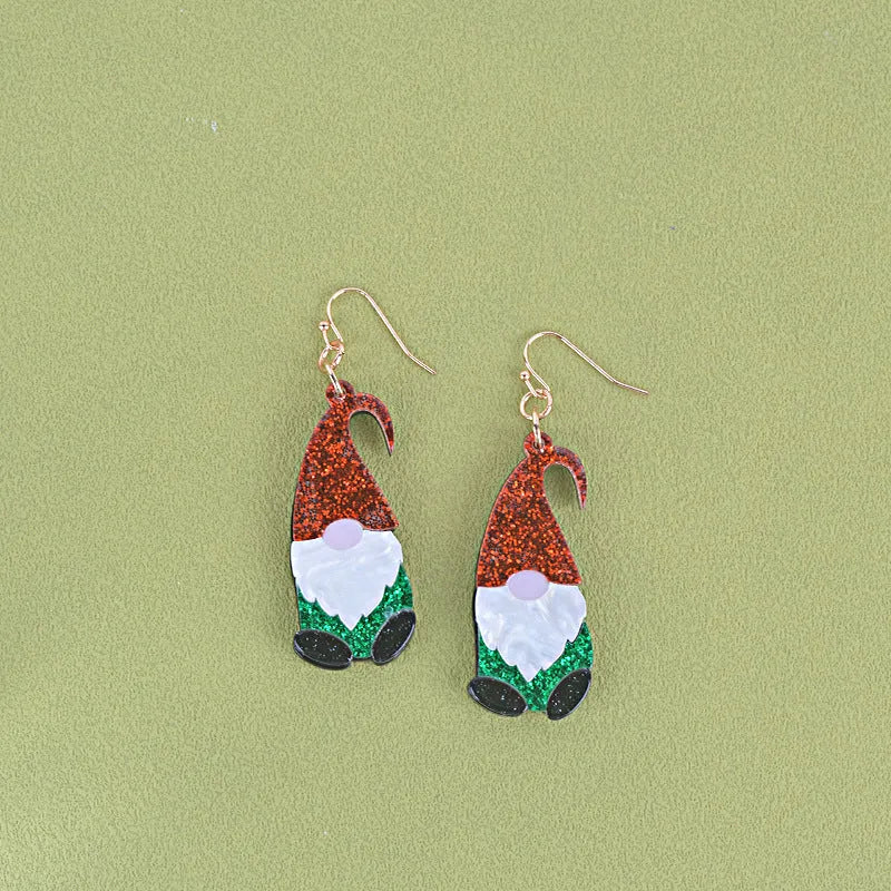 Acrylic Santa Claus cartoon character earrings in red, green, and red/green hat styles.