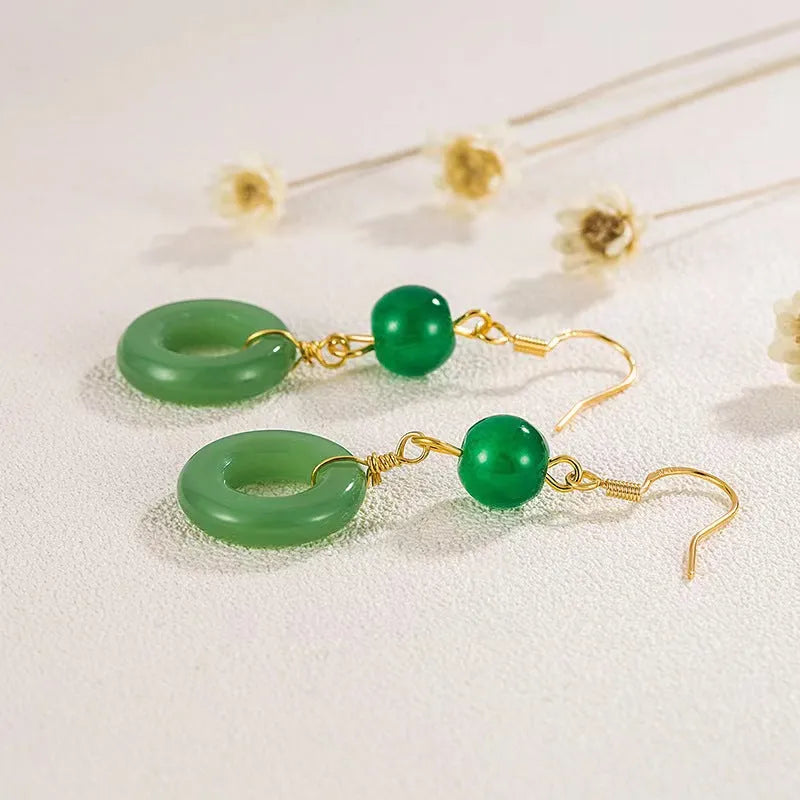 Pair of green geometric peace buckle earrings with Chinese cheongsam design inspiration