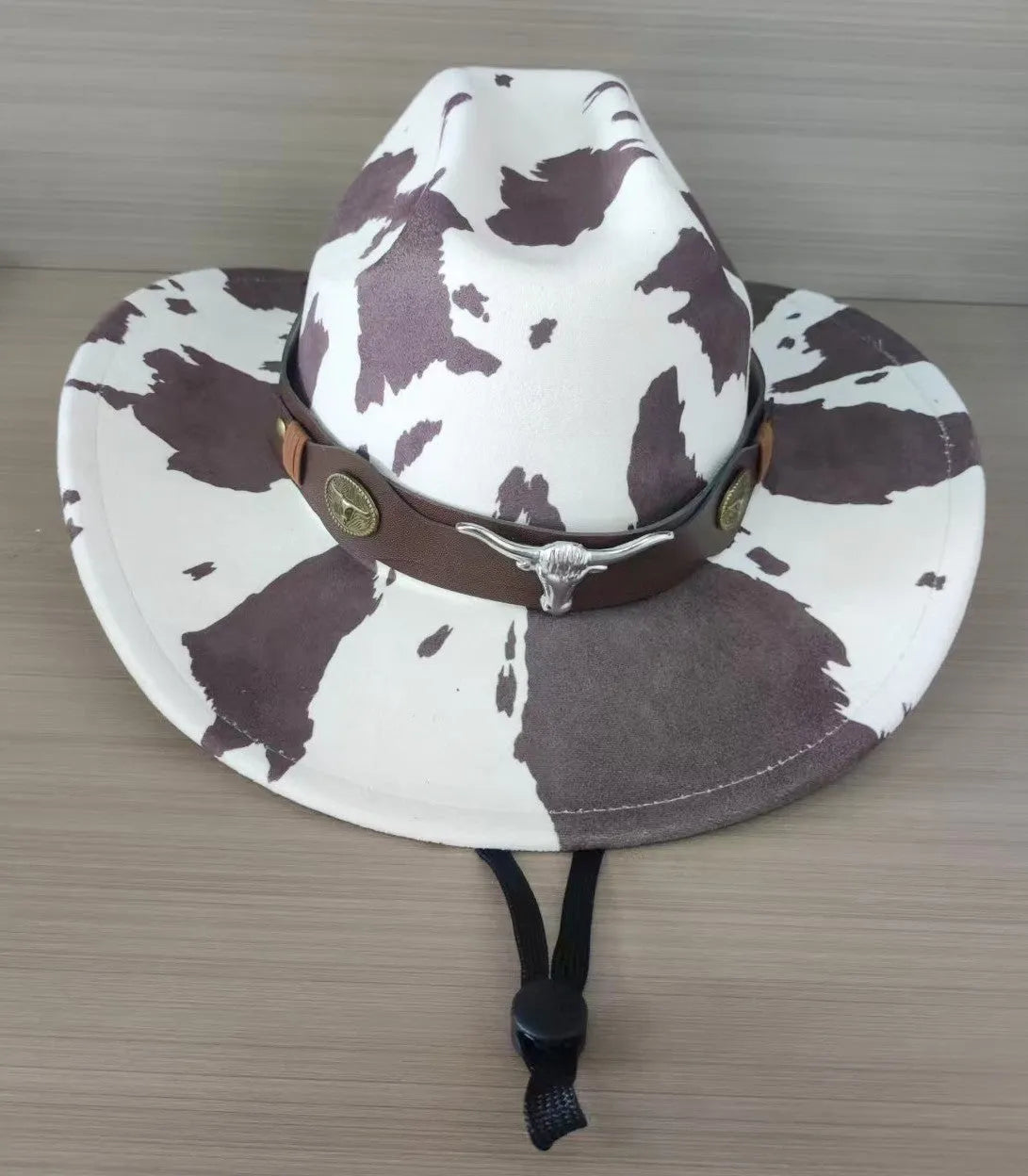 Brown leather velvet Western cowboy hat with curved brim and conical crown