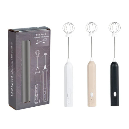 Handheld USB rechargeable electric whisk in apricot colour with mixing attachment