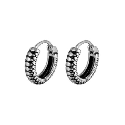 Silver retro twist earrings with geometric stripe design and round elements on stainless steel