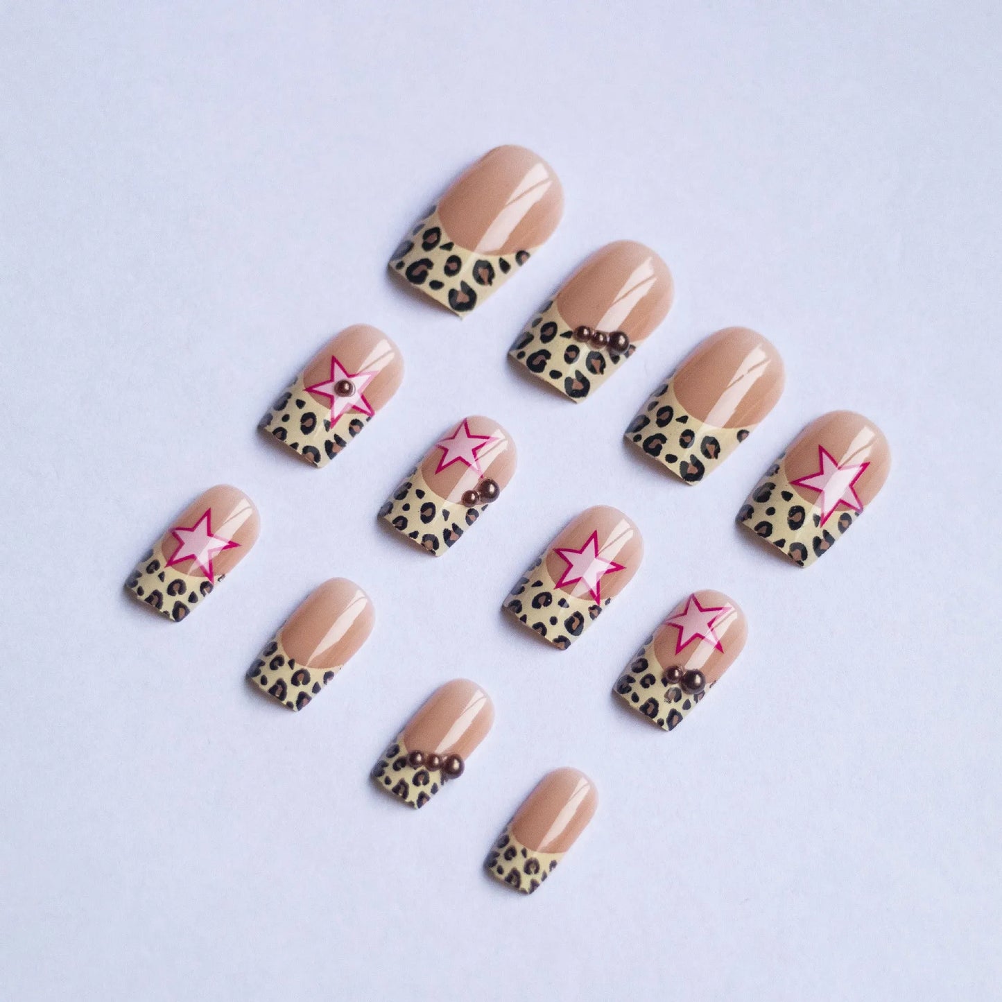 Leopard print French false nails with five-pointed star and pearl diamond accessories in retro European style