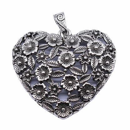 Hollow floral love pendant in ancient silver finish with European American styling