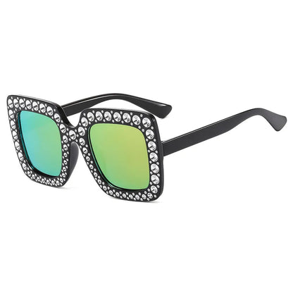 Plastic sunglasses with fashion personality styling in various colour options including black frame and transparent tea frame