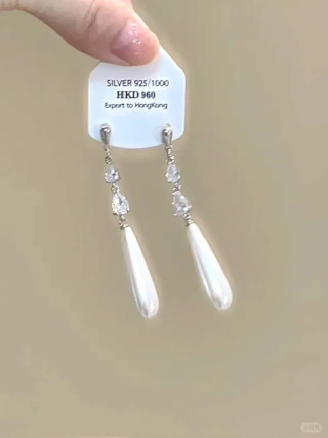 Geometric alloy ear clip with rhinestone stars, tassel and heart decoration for women