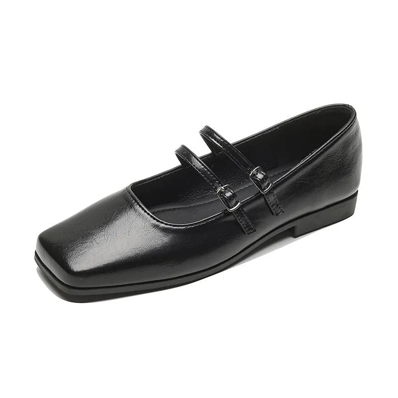 Women's silver genuine sheepskin Mary Jane ballet flats with an adjustable cross-buckle strap on the instep.