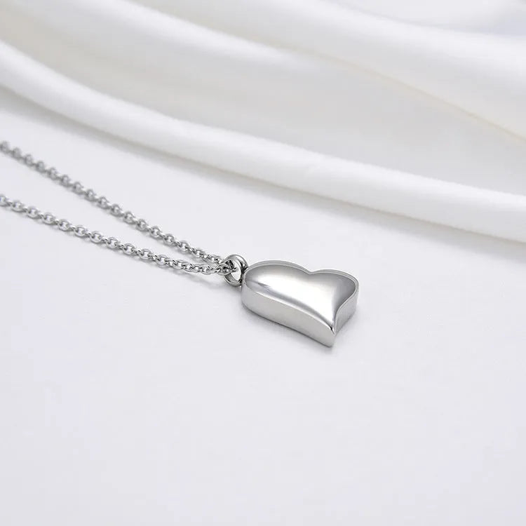 Silver curved 23mm peach heart pendant stainless steel necklace with 51cm + 5cm adjustable chain