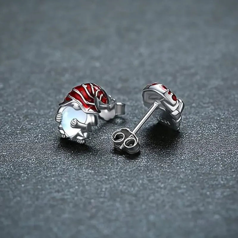 Santa Claus heart-shaped earrings in white gold colour on copper background