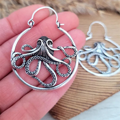 Vintage antique silver octopus earrings made from zinc alloy for unisex wear.