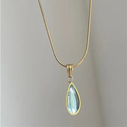 Retro blue and green water drop necklace with gem inlay on a silver titanium steel snake chain.