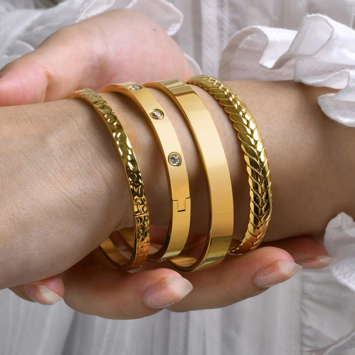 Stainless steel glossy bracelet with drill detail, available in 6mm and 3.9mm widths and multiple colour codes