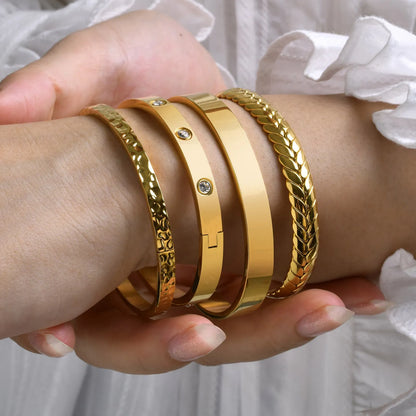 Stainless steel glossy bracelet with drill detail, available in 6mm and 3.9mm widths and multiple colour codes
