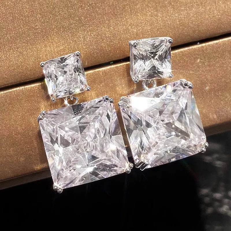 Copper geometric square design earrings for women, featuring a bold quadrilateral shape and available in E3771 white gold colour finish or E3772 gold colour finish, sold as a single pair.