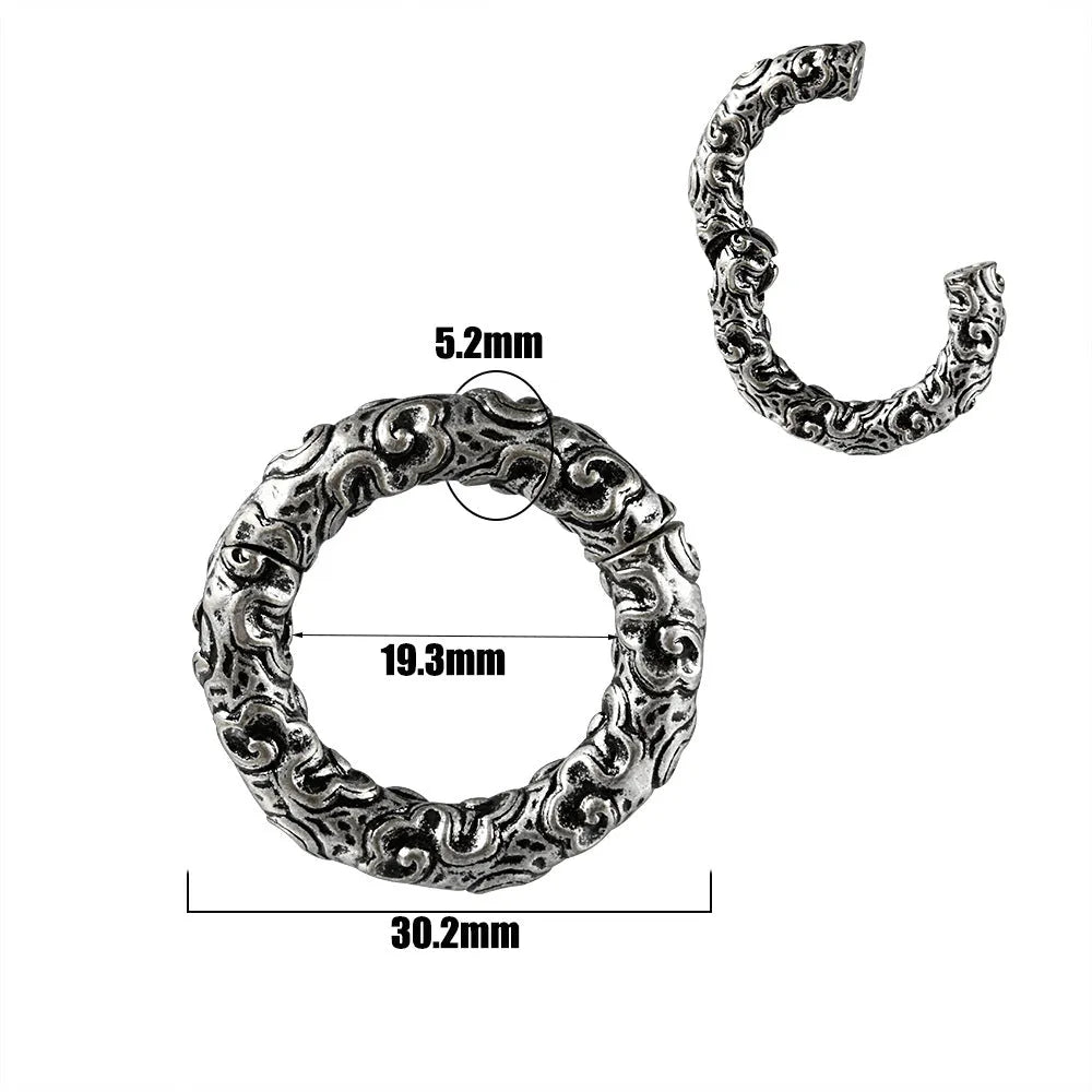 Stainless steel totem pattern earrings in electroplated finishes, showing one of fifteen style variations.
