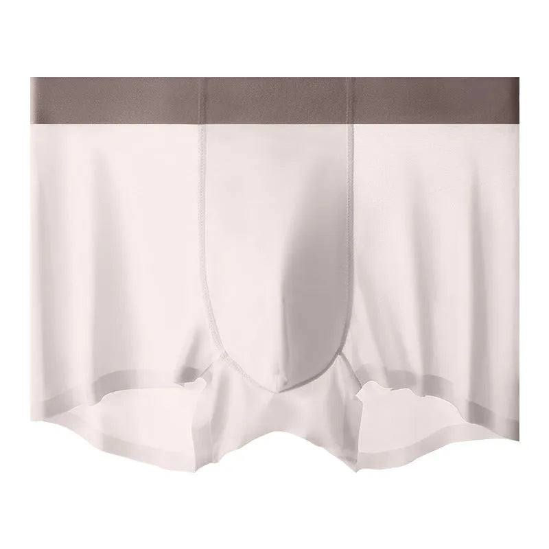 Man wearing bean green Ice Silk shorts with a seamless design and mid-waist fit.