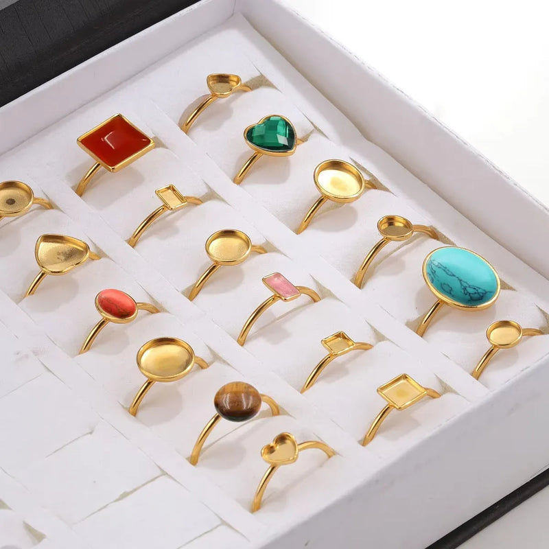 Stainless steel jewellery polishing ring setting DIY accessories in golden electroplated colour with totem pattern, includes ring holder for medium-sized rings with multiple shape options including oval, heart, rectangle, square, and round settings