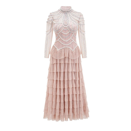 Black long sleeve beaded dress for women with 3D decoration and mid-waist fit.