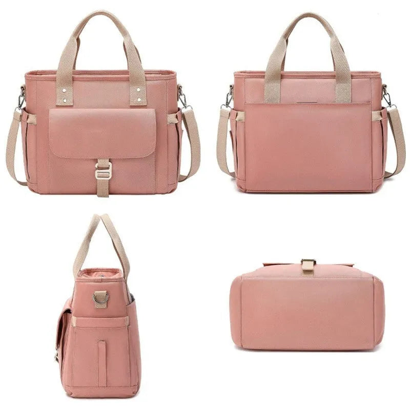 A pink cube-style Oxford cloth belt bag with a removable shoulder strap and a side pocket.