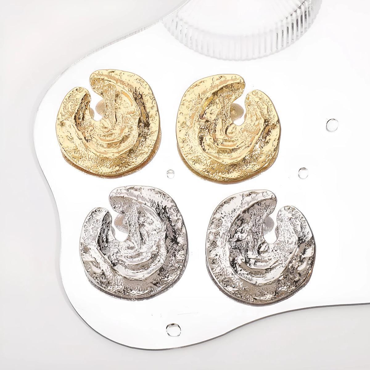 Geometric women's earrings with irregular pleating and concave-convex texture in gold colour