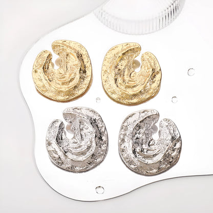 Geometric women's earrings with irregular pleating and concave-convex texture in gold colour