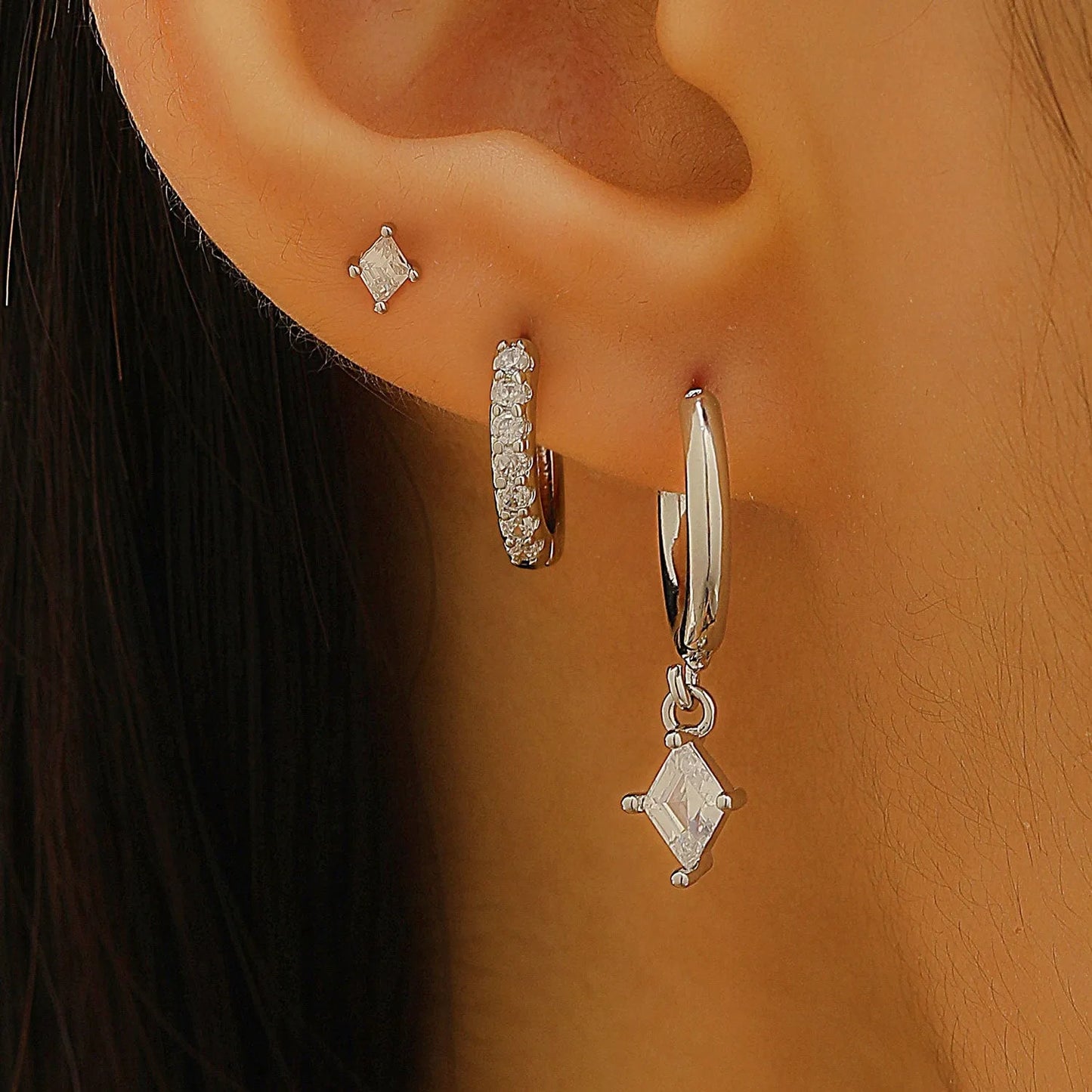 Ladies three-piece geometric earring set with inlaid zircon in gold and white colours